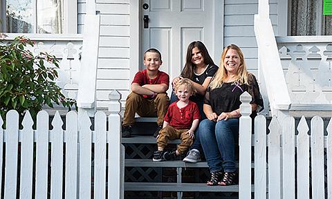 Family Sitting on Front Porch Steps